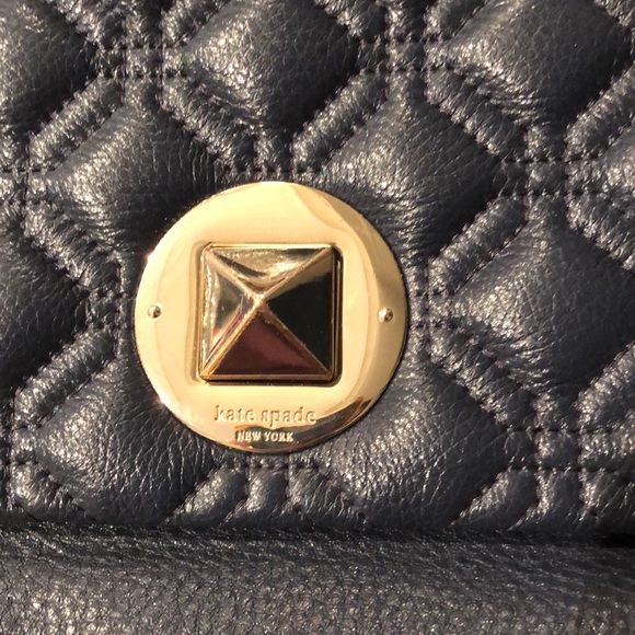 Kate Spade navy blue purse with gold detailing. - Picture 2 of 5